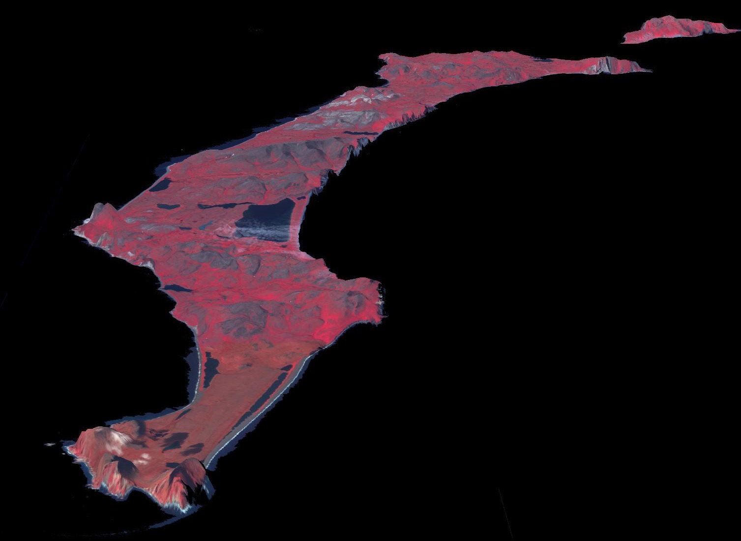 A satellite view of St. Matthew Island from above, long and thin with a lake near its southern end, rendered in false colour with vegetation in red