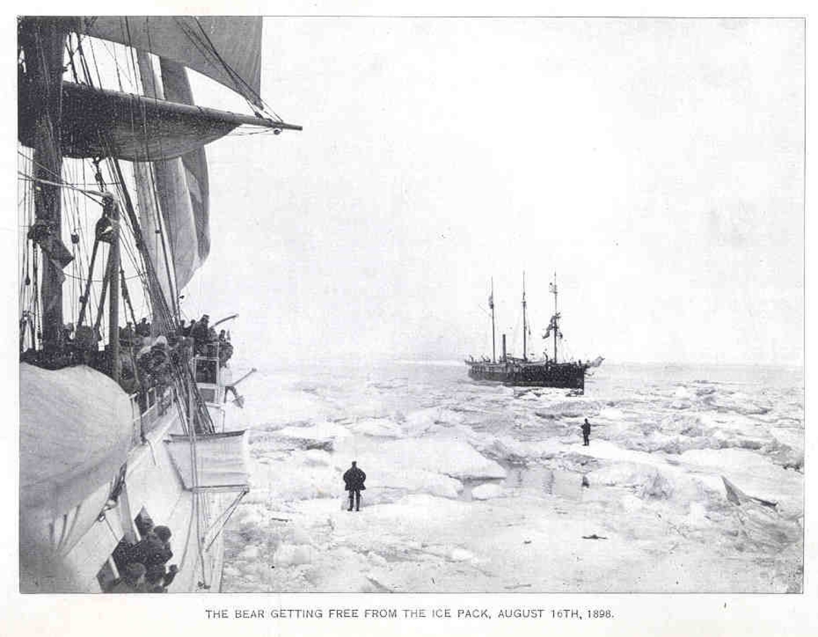 View from the Bear's deck of the ice pack opening, men on the floe and a whaler in the distance, 16 August 1898